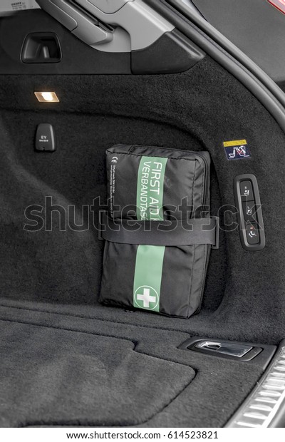 First aid kit in a luxury\
car trunk