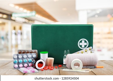 First Aid Kit  With Medical Supplies On Background