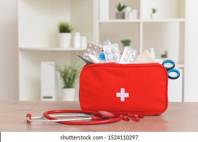 First aid kit on table in clinic