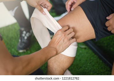 First aid at knee trauma - Powered by Shutterstock