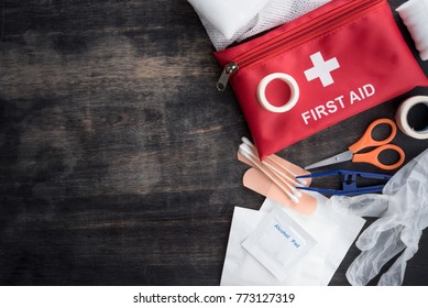 First aid medical kit on wood background,copy space,top view - Shutterstock ID 773127319