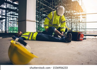 First aid support accident in site work, Builder accident fall scaffolding to the floor, Safety team help employee accident. - Shutterstock ID 1536906233