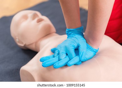 First Aid Training - Cardiopulmonary resuscitation. First aid course on cpr dummy. - Powered by Shutterstock