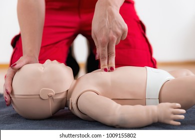 First Aid Training - Cardiopulmonary Resuscitation. First Aid Course On Baby Dummy