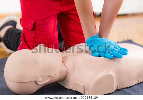 First Aid Training - Cardiopulmonary
resuscitation. First aid course on cpr
dummy.