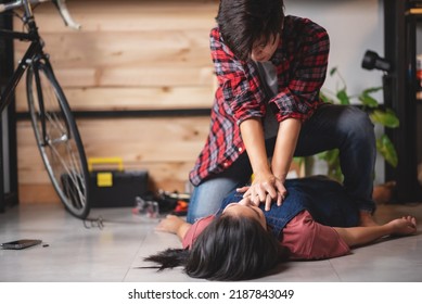 First aids emergency CPR on heart attack woman laying unconscious in home, One part of the process resuscitation - healthcare and insurance concept. - Powered by Shutterstock