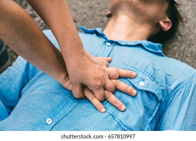 First Aids Emergency CPR on Heart Attack Man , One Part of the Process Resuscitation - Healthcare Concept in Coronavirus Outbreak and Other Situation - Shutterstock ID 657810997