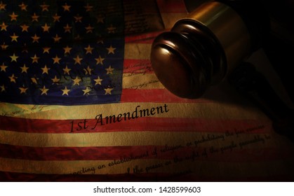 First Amendment of the US Constitution text and United States flag                               