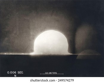 First Atomic Explosion on July 16, 1945. Photograph taken at .006 seconds after the detonation shows a plasma dome. Manhattan Project, World War 2. Alamogordo, New Mexico.