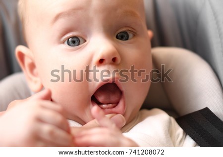 The first babies teeth. The lower front teeth (the lower central incisors).  Teething