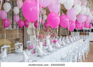 First Birthday Party Of A Baby Concept Made Of White And Pink Colors Balloons And Candles