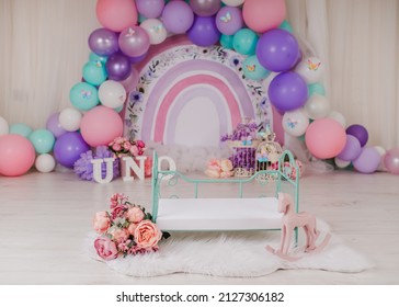 First Birthday Smashcake Photo Session With A Rainbow Of Balloons And Flowers In A Photo Studio