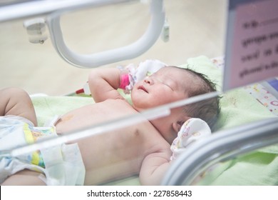 First Day Of Asian Newborn Baby In Incubator Care At Nursery Hospital