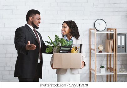 First Day At Office. African American Businessman Welcoming New Female Employee To His Team At Modern Office