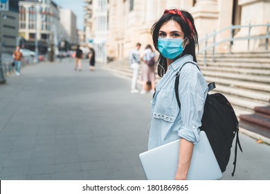 First Day Of School. Female Student Wearing Protective Face Mask Walking Around College During Pandemic. University Background.