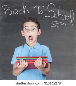 First Day Of School. Scared Schoolboy In Classroom.