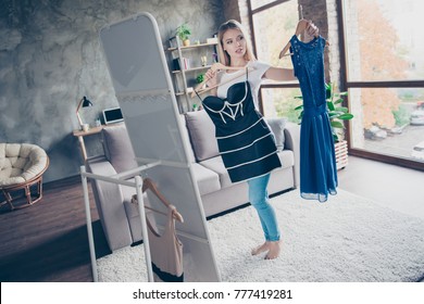 The First Dress Is Wonderful And The Second One Is Nice Too! Beautiful Attractive Cute Lovely Unsure Woman Is Holding Dresses And Doesn't Know Which One To Choose