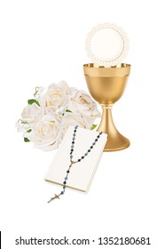 First holy communion, composition with chalice, rosses, book and rosary - Shutterstock ID 1352180681