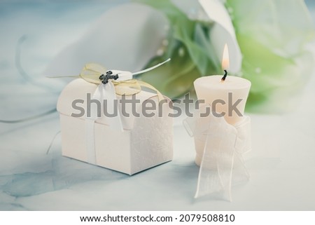 First holy communion or confirmation - candle,  small present and flowers