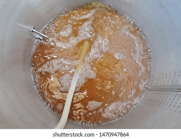 First Mash Runoff Into The Brew Kettle For A Home Brewed Blonde Ale