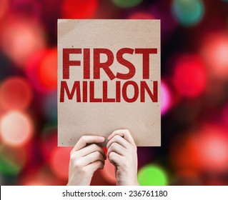 First Million card with colorful background with defocused lights