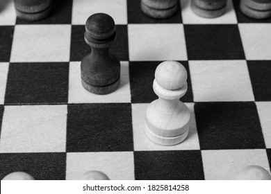 The First Move In Chess Was Made By Pawns To Meet Each Other. Chess Game Start, Close-up, Selective Focus