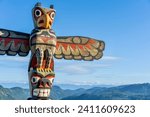 A First Nations totem pole welcomes travellers at the summit of the Malahat section of the Trans Canada highway near Victoria BC