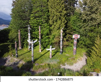 First Nations Totem Poles In Stanley Park, Vancouver Canada - Indigenous Art And Culture - Aerial View