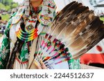 First Nations. Traditional outfit at Native American pow-wow. Traditional costumes and ornaments.
