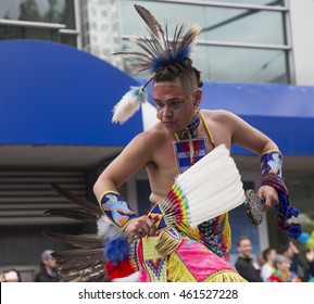 First Nations Young Male Is Dancing At Pride Parade In Vancouver, Canada, July 31, 2016