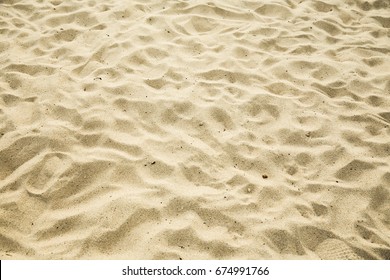 First Person Perspective Of Hot Yellow Beach Sand Texture, Summer Holiday Vacation Background.