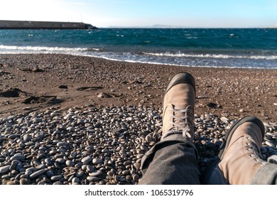 First Person Perspective Of Man Legs On The Autumn Beach.