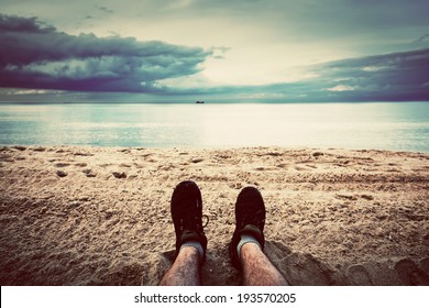 First Person Perspective Of Man Legs On The Autumn Beach. Vintage, Retro Style