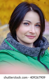 First Person Perspective Self Portrait By Cute Young Woman In Short Black Hair And Dressed In Thick Green Coat