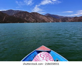 First Person Vies Of Fishing Boat Cruising On Pyramid Lake In California, USA. Ego Perspective Of Blue Boat Floating On Green Water Of Mountain Lake During Summer In San Bernadino Mountains.