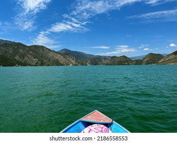 First Person Vies Of Fishing Boat Cruising On Pyramid Lake In California, USA. Ego Perspective Of Blue Boat Floating On Green Water Of Mountain Lake During Summer In San Bernadino Mountains.