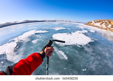 First Person View Gopro Stick In His Hand On The Ice Of Lake Baikal.