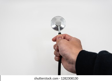 First Person View Hand Holding Stethoscope Isolated Background