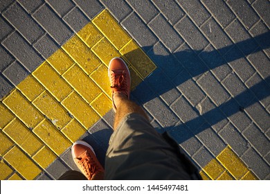 First Person View Man In Red Sneakers