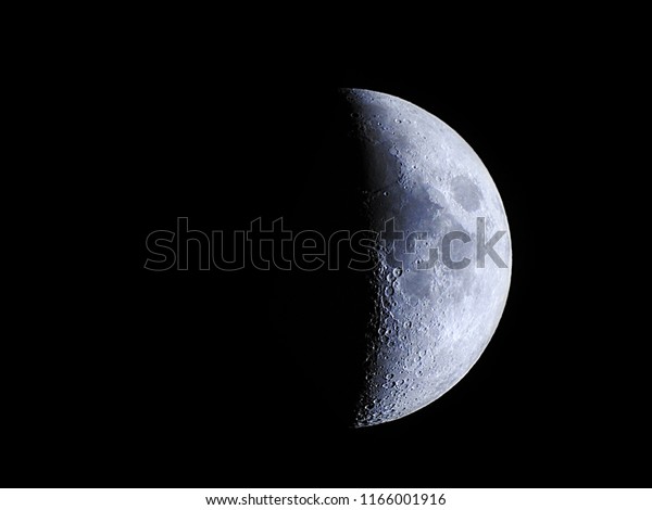 First phase moon / The Moon is an astronomical\
body that orbits planet Earth and is Earth\'s only permanent natural\
satellite