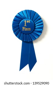 A First Place Blue Ribbon On A White Background