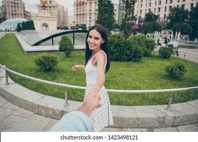 First point view photo of charming lady gather guy hold hand whirl fun excited vacation married laugh laughter romance romantic white beautiful fashionable dress skirt city outdoors