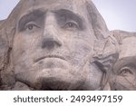 The first president of the United States, George Washington, upon Mount Rushmore