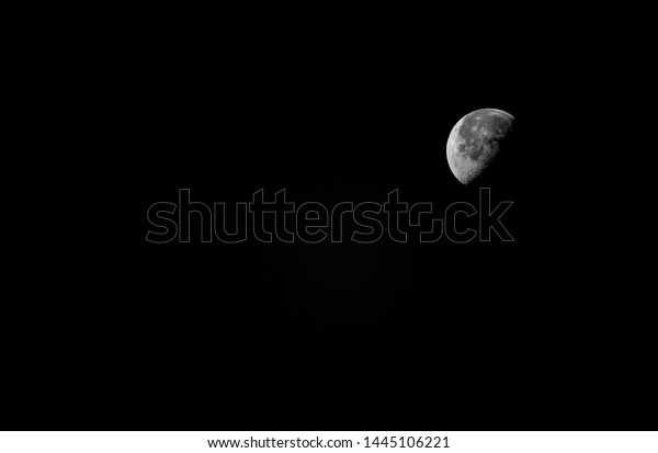 First quarter moon at\
night