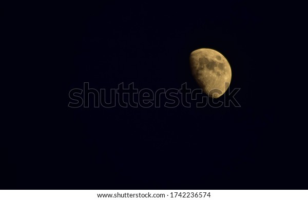 first quarter moon on night
sky