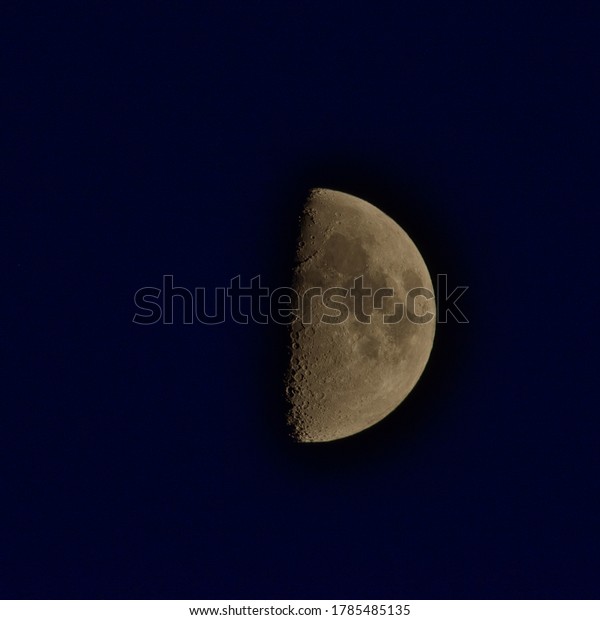 First\
Quarter Moon Phase over Burnaby, BC Canada.\
