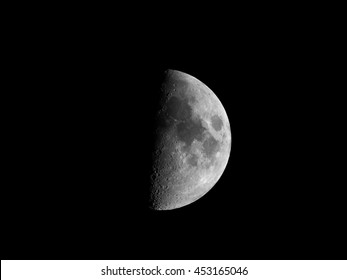 First quarter moon seen with an astronomical telescope (seen through my own telescope, no NASA images used)