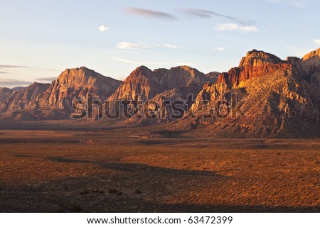 First rays of warm sunrise light in Nevada's Red Rock Conservation Area.