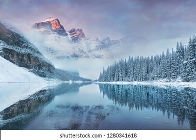 First snow Morning at Moraine Lake in Banff National Park Alberta Canada
Snow-covered winter mountain lake in a winter atmosphere. Beautiful background photo