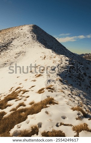 First snow on mount Cima di Lemma, Orobie, Italy